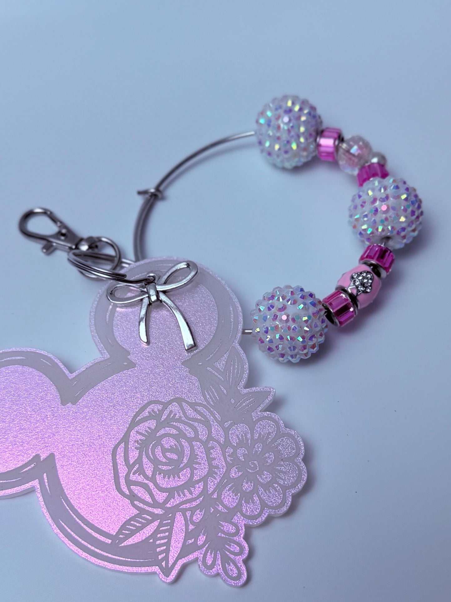 Pink Iridescent Mickey Floral Keychain  Engraved Flower Design with Dangling Minnie Mouse Charm, Disney-Inspired Acrylic Bag Charm