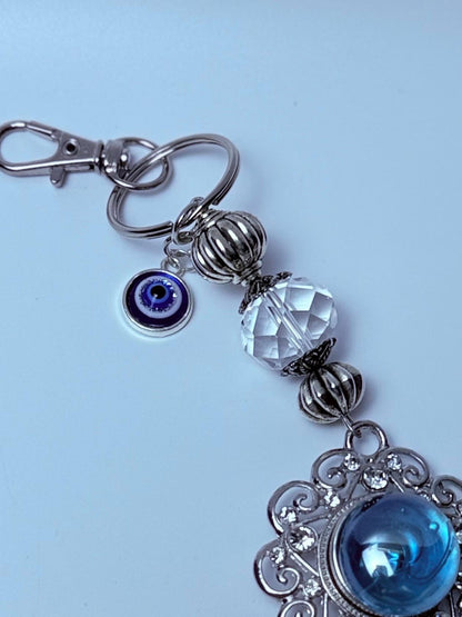 Blue Gemstone Evil Eye Bag Charm: Boho Silver Tassel, Feather & Crystal
