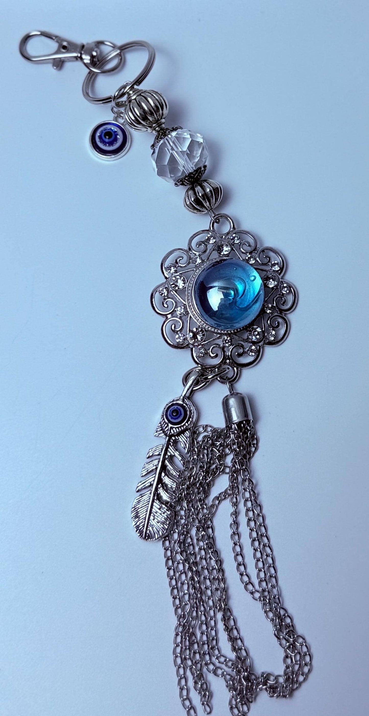 Blue Gemstone Evil Eye Bag Charm: Boho Silver Tassel, Feather & Crystal